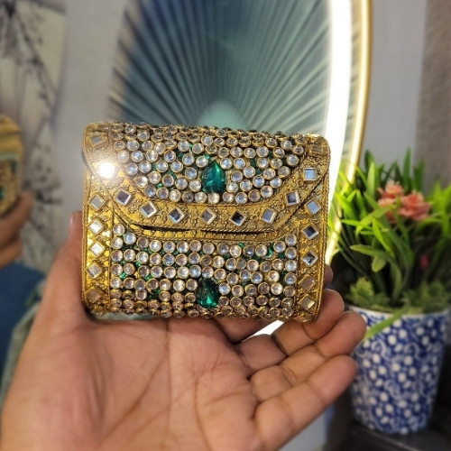 Emerald Glow Royal Charm Clutch